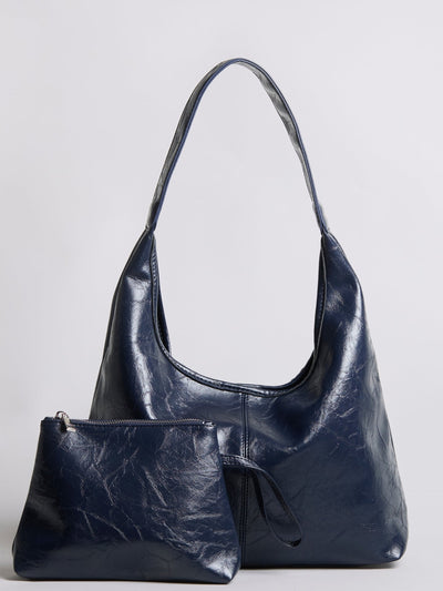 Bolso de mano Scarlett de piel desgastada