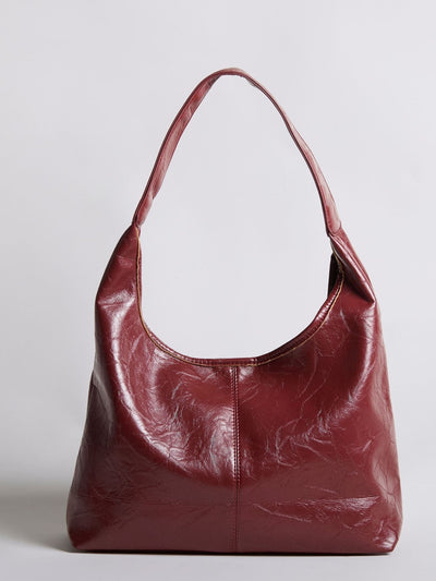 Bolso de mano Scarlett de piel desgastada