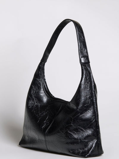 Bolso de mano Scarlett de piel desgastada